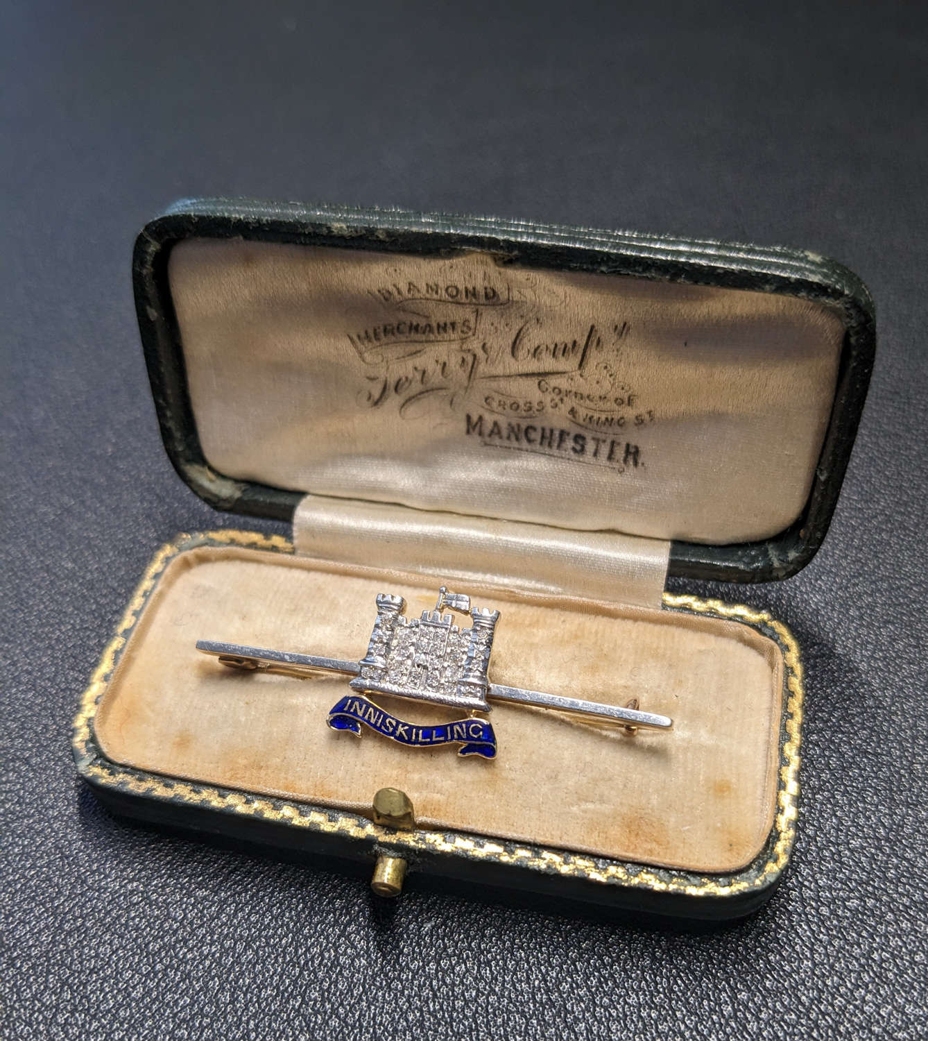 Cased 6th Inniskilling Dragoon Guards Diamond Encrusted Platinum and Gold Brooch